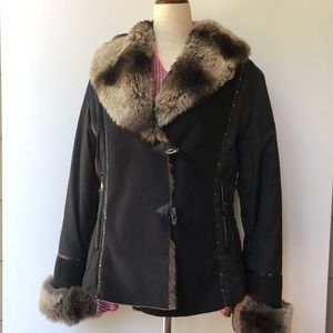 Suede jacket with faux fur around collar.